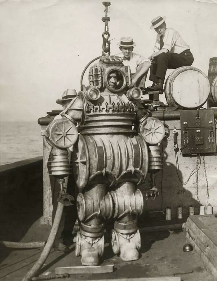 Early diving suit, historical deep‑sea exploration, antique diving technology, Iron Man diving suit, underwater exoskeleton history